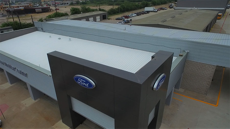 A Ford sales store roof with coating