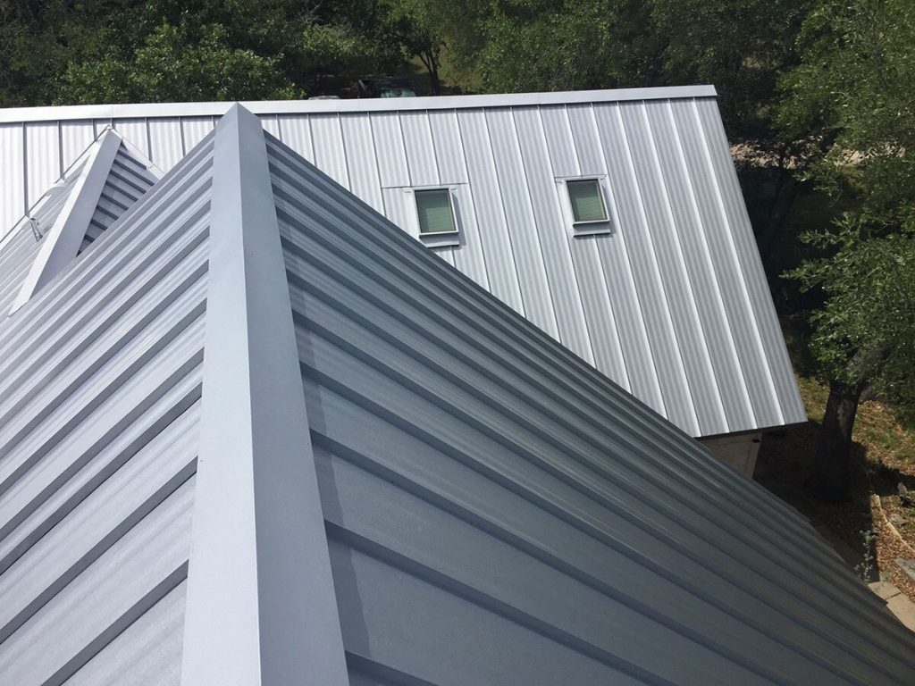 Newly coated white metal roof