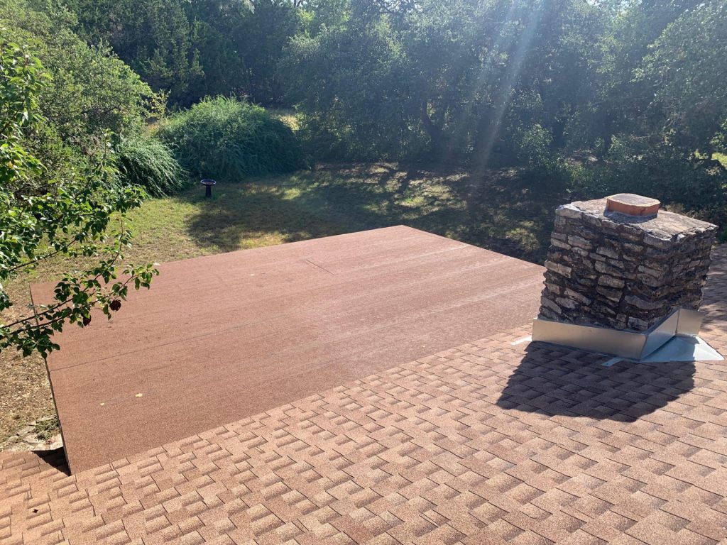 A finished brown flat roof system